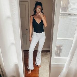 White flare jean Hudson jeans with frayed bottoms